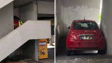 Auto in sharing incastrata sulla scalinata di una palazzina al laurentino 38